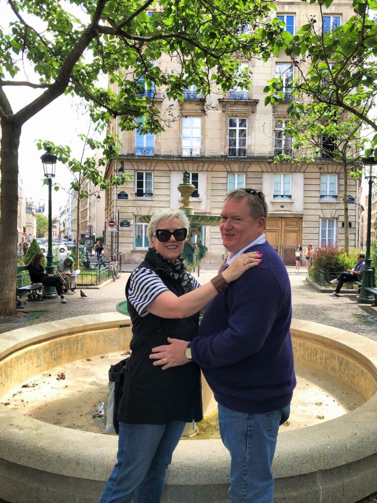 Russ and Leslie in front of "Emily in Paris" apartment