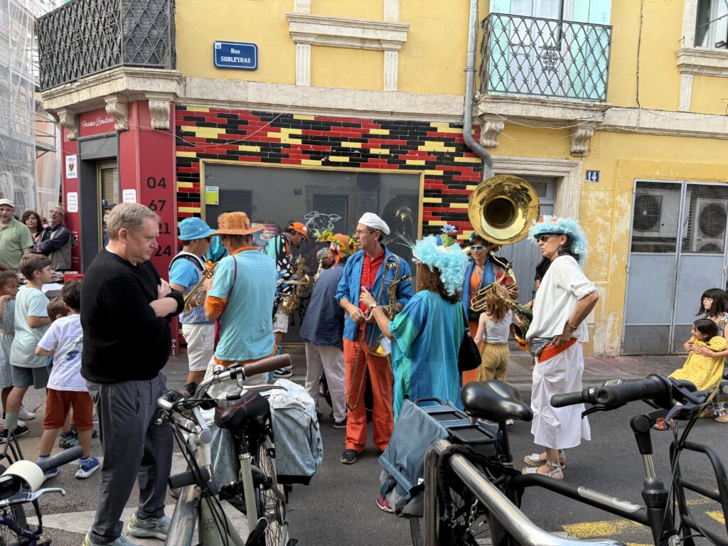 Man checking out street band.
